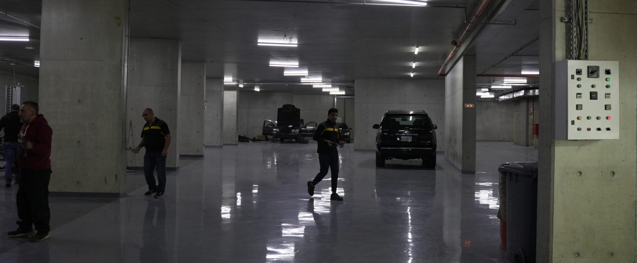 The 16-bay technical center hall with the Monza team at work