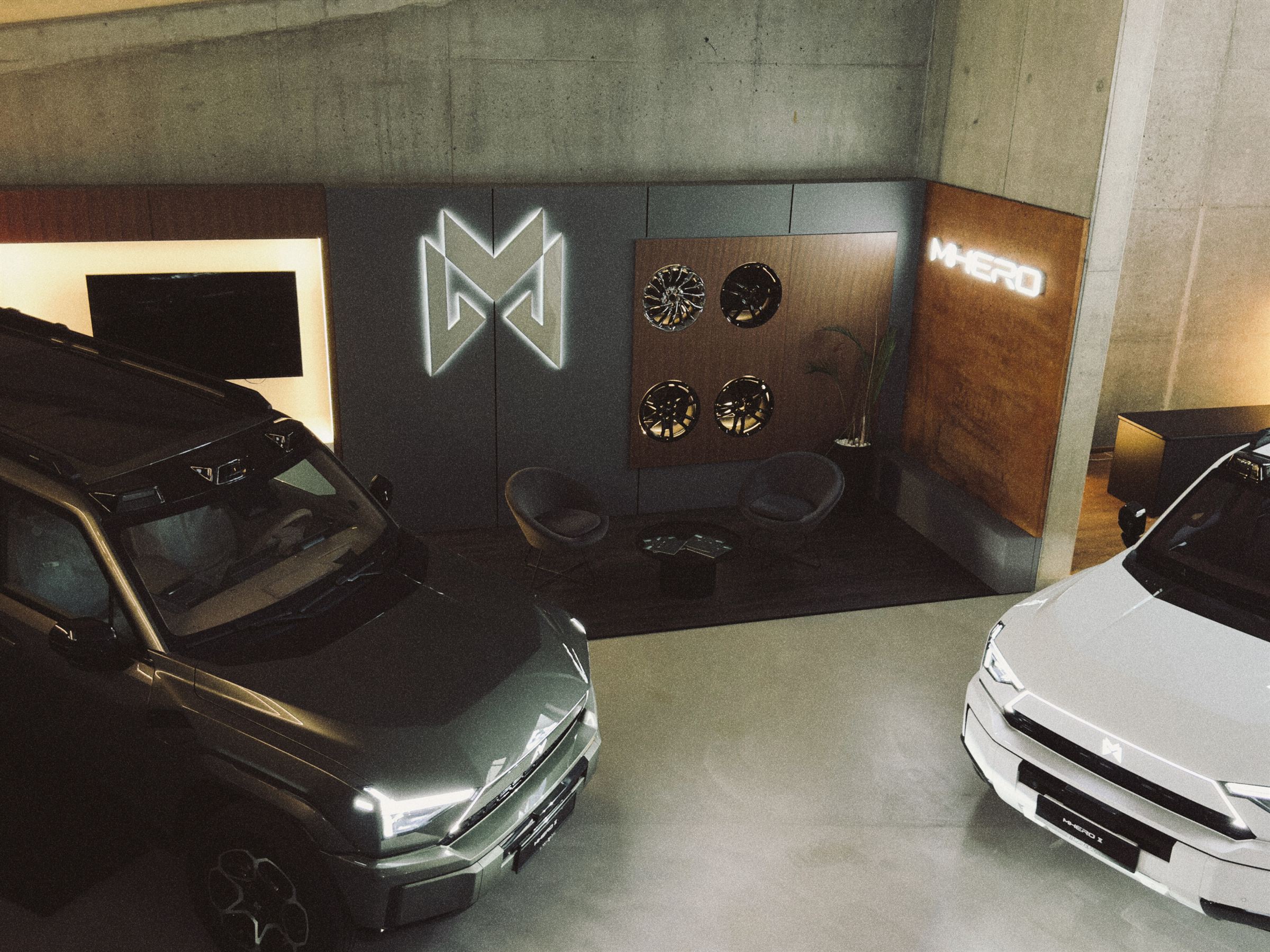 Two MHERO vehicles inside the Monza SAL showroom